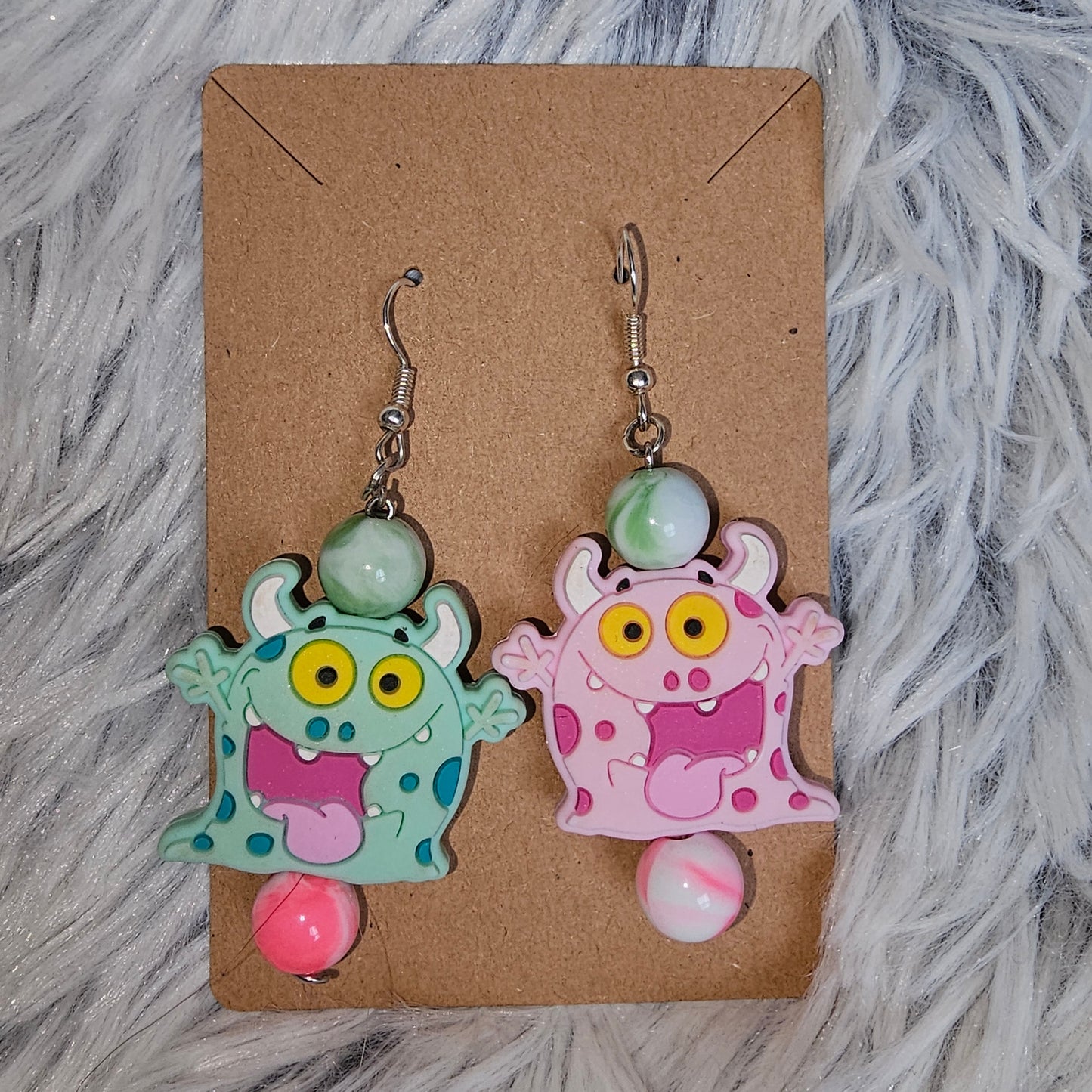 Teal/pink monsters earrings