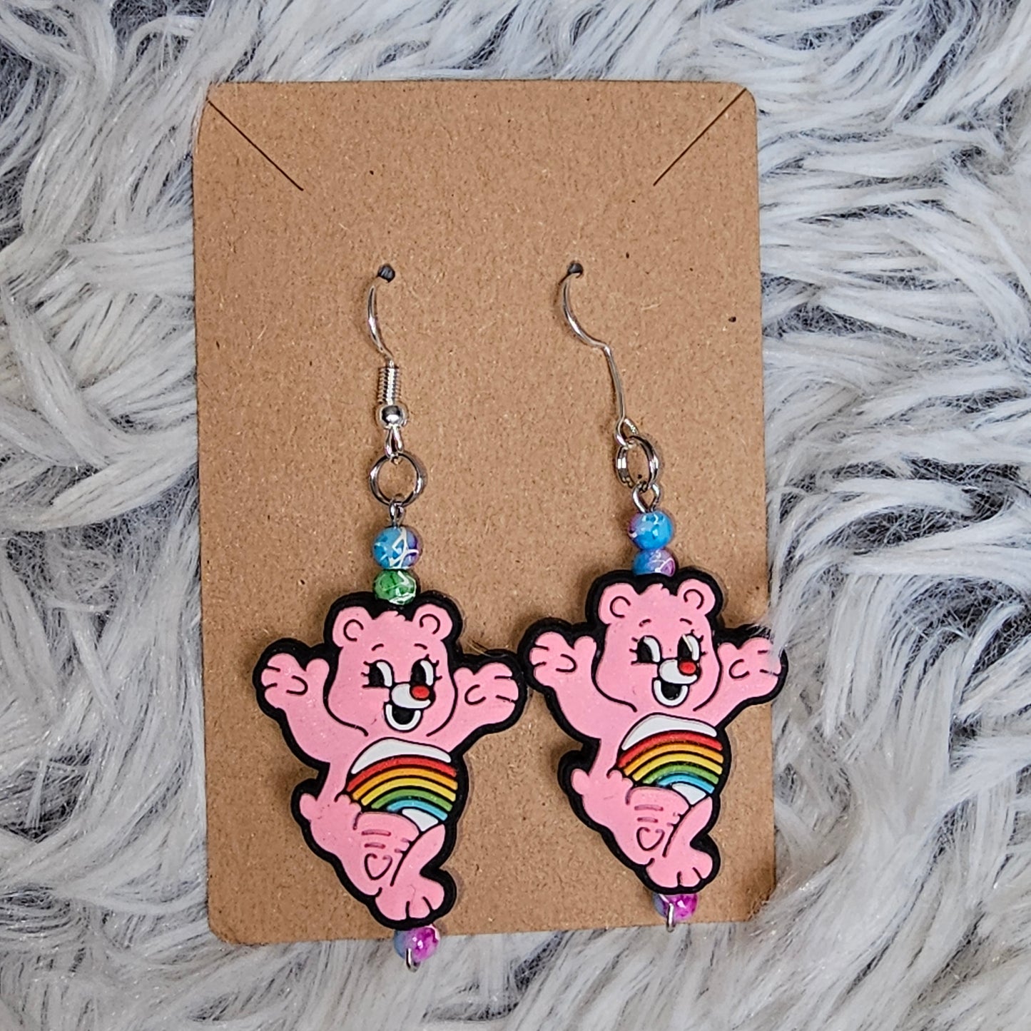 Pink Care Bears earrings