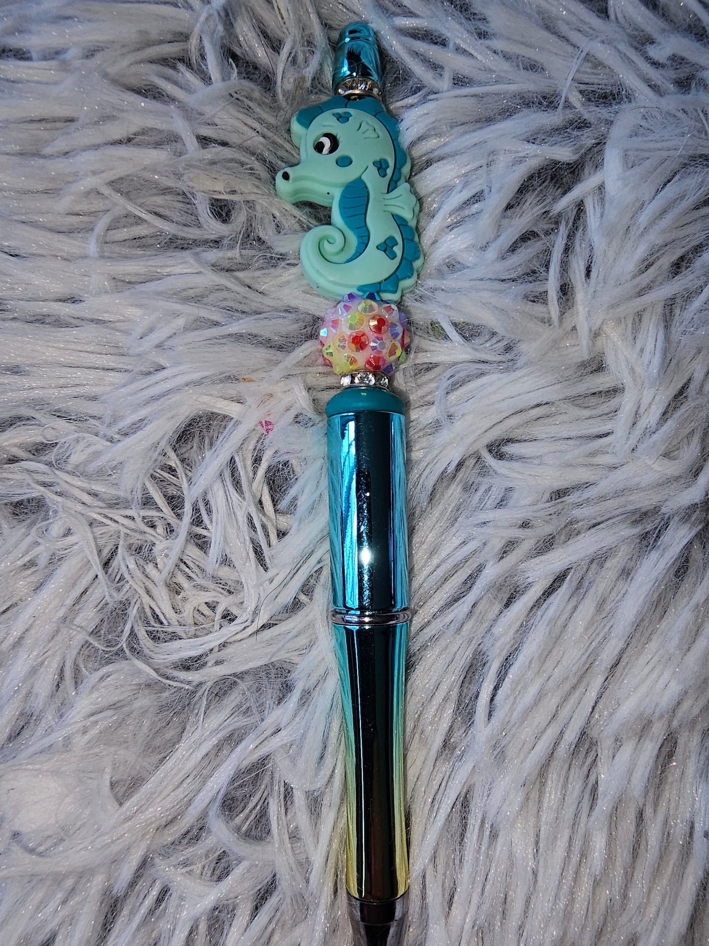 Teal seahorse pen