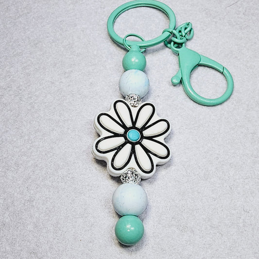 Teal/white flower keychain