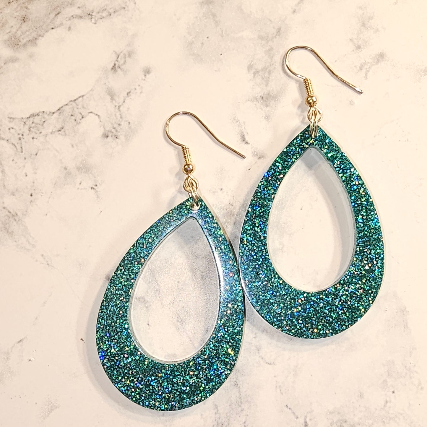 Teal holographic oval earrings